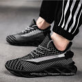 New Men′s Shoes Mesh Upper Light Sports Running Shoes Large Size Couples Breathable Flying Knitting Shoes Sneakers